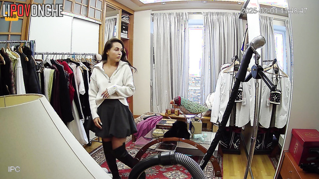Hidden camera in the house of a seductive prostitute: the girl tries on new outfits.