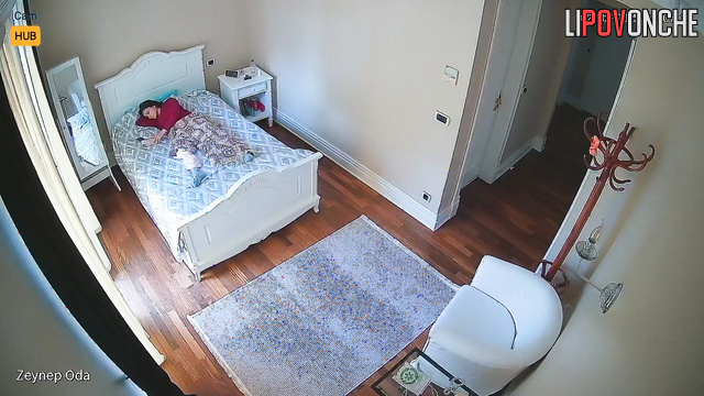 Hidden camera filmed a Turkish girl hotly masturbating while lying on her side.