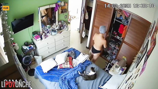 Young naked Latina with an sporty body tidies up after a shower