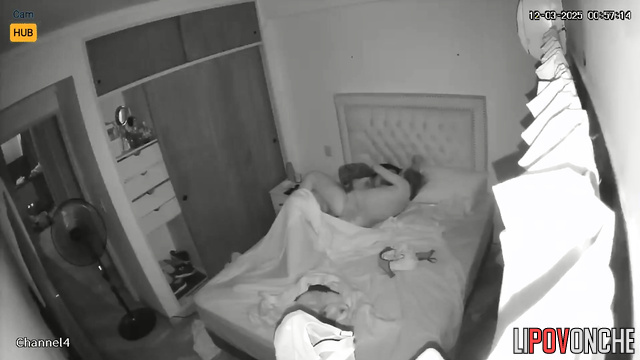 A tattooed, bearded man inserts his hot cock into a gorgeous girl from behind