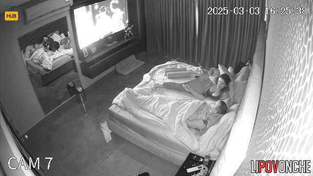 A talkative, busty Mexican girl plays with a guy's cock under the blanket