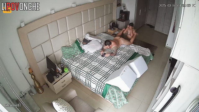 Brunette in sexy lingerie licks her bored tattooed boyfriend's anus