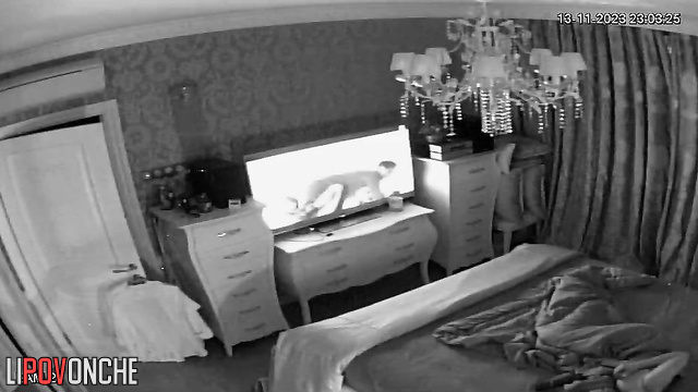 A naked beauty brings herself to an intense orgasm while watching TV