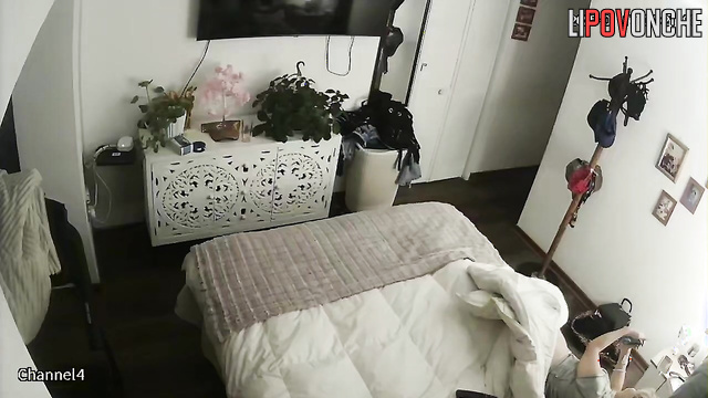 A cute blonde is filming herself playing with her shaved pussy on her phone
