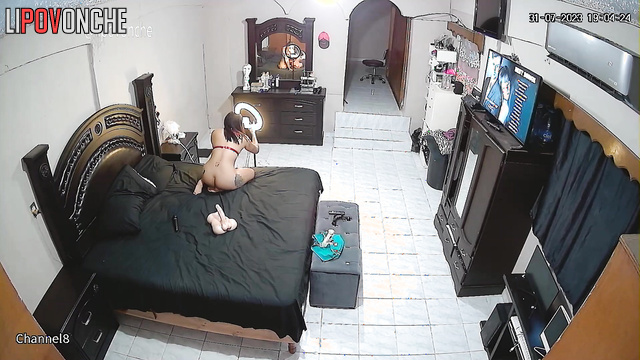 A tattooed brunette films herself testing out new sex toys on her phone