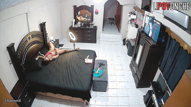 A tattooed brunette films herself testing out new sex toys on her phone