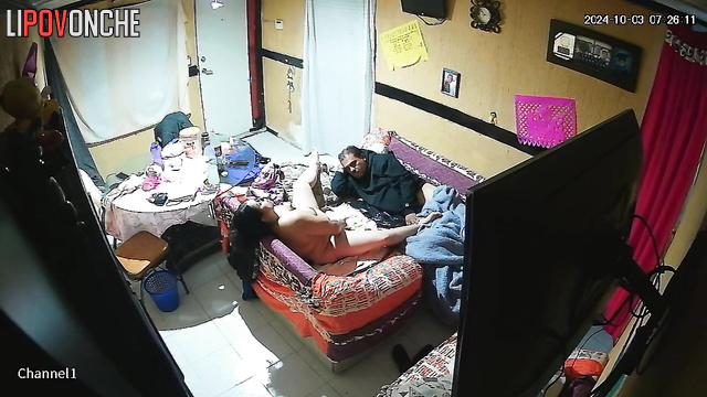 The husband watches with interest as his fat wife shoves a long dildo into her cunt