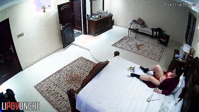 An arab milf in sexy lingerie films herself playing with her wet pussy on her phone