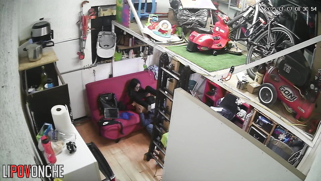 A young girl wearing glasses invited her boyfriend into the garage for some hot sex
