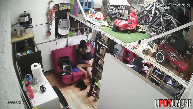 A young girl wearing glasses invited her boyfriend into the garage for some hot sex