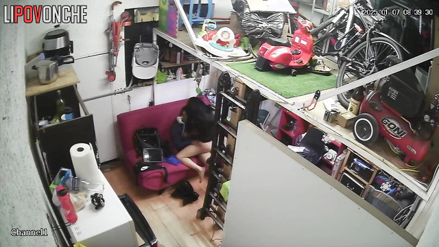 A young girl wearing glasses invited her boyfriend into the garage for some hot sex