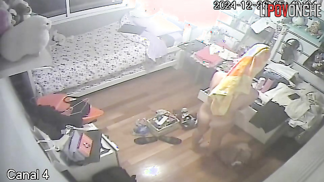 A cute brunette with a sexy butt dances without panties after a shower