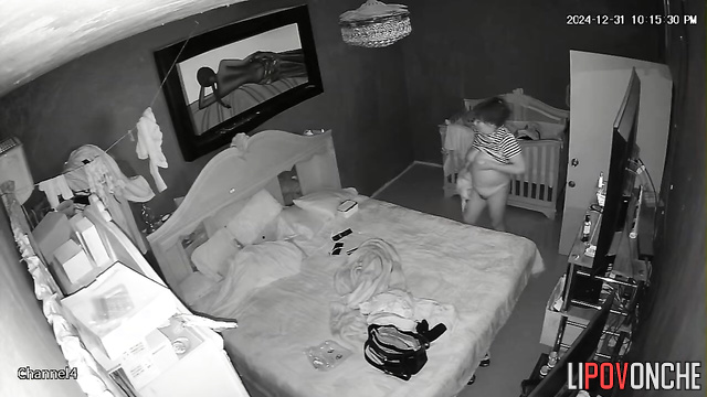 A chubby mommy with a hairy pussy is waiting for her husband with her legs spread
