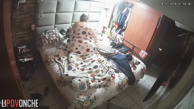 The fat milf smiles as her husband plays with her big, soft tits