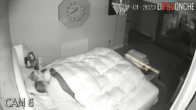 A naked, tattooed mommy sneaks up on her sleeping husband in the dark