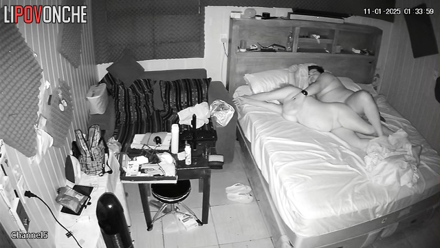 Chubby people using a sex toy during hot bed games