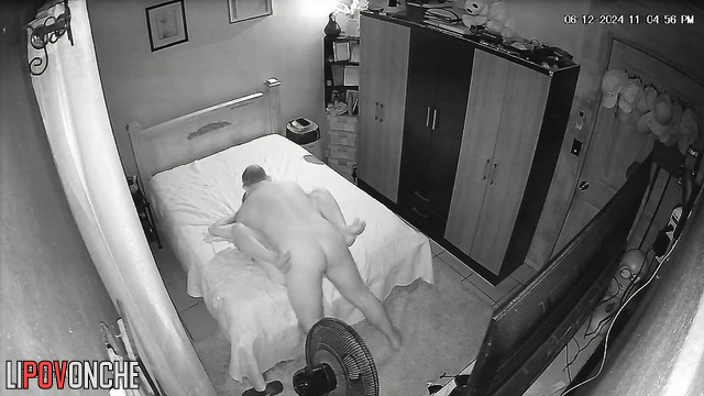 A sassy brunette teases and sexually harasses her naked, bald husband