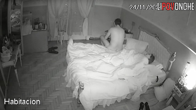The sly wife pulls down her panties and presses her butt against her husband's cock
