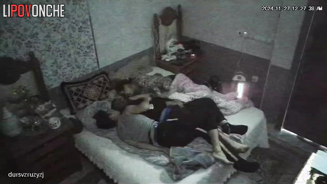 Something interesting is happening right now on the bed between three people