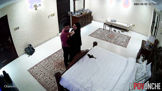 Horny muslim couple enjoying kissing in bed, look
