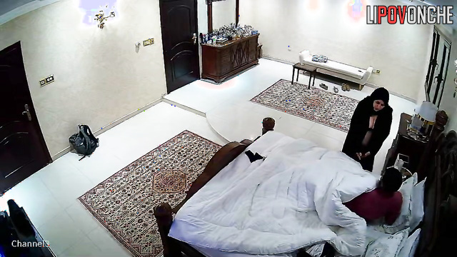 Horny muslim couple enjoying kissing in bed, look