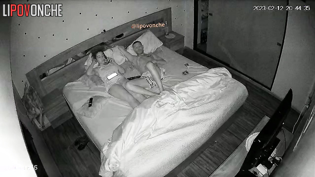 Couple lying in bed and does not touch each other