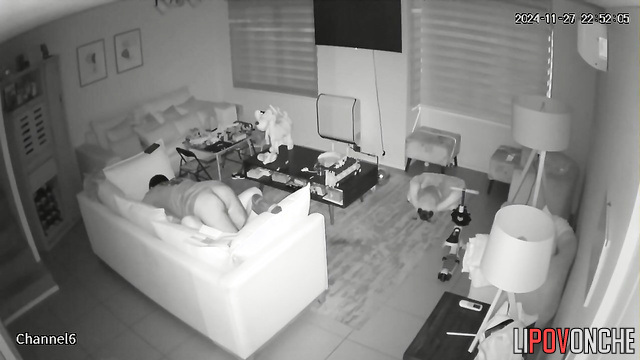 Active sex in the missionary position on a soft sofa