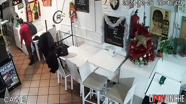 Lovers kissing and fucking in the closed italian cafe