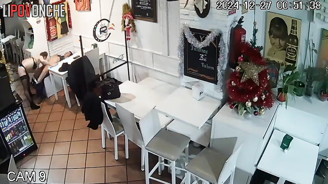 Lovers kissing and fucking in the closed italian cafe