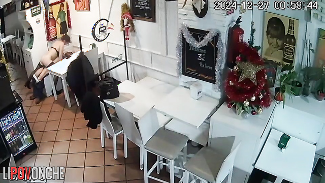 Lovers kissing and fucking in the closed italian cafe
