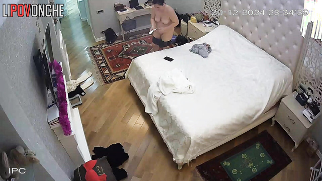 She glued the pad to her panties and continued getting dressed