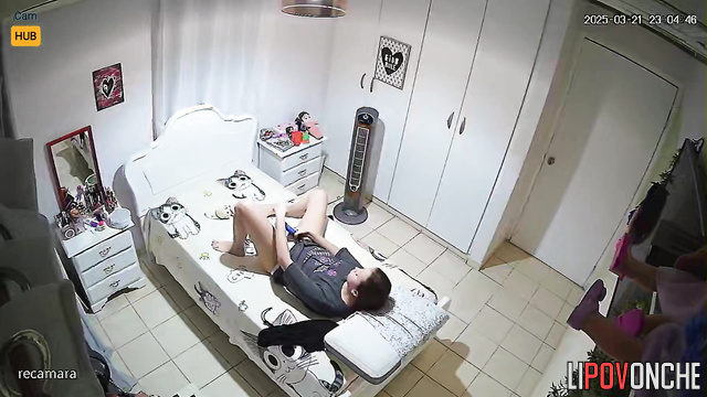 Yuong lady playing with a gift that her fiance gave her