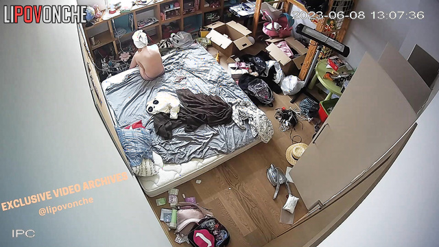 She have just showered and chills naked on her bed in bedroom
