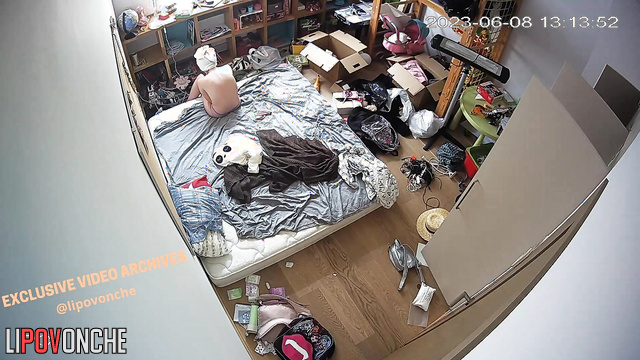 She have just showered and chills naked on her bed in bedroom