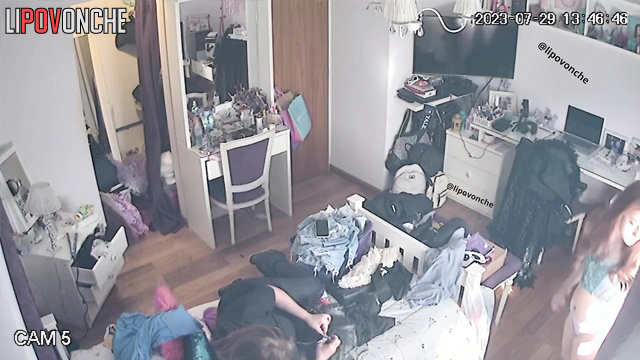 Relative of this sexy redhead helps her to pick the best outfit for date