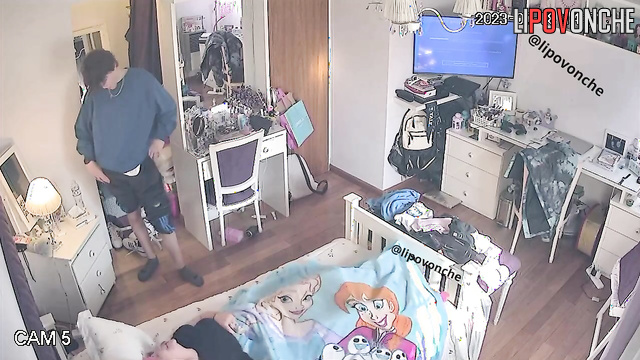 Teens enjoying something interesting under the blanket