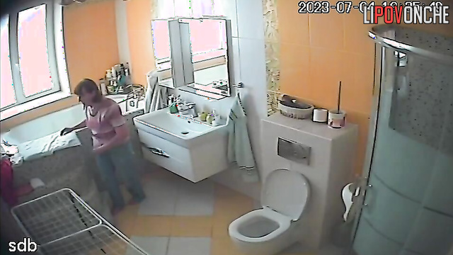 Adult daughter completely undresses in front of her elderly mother