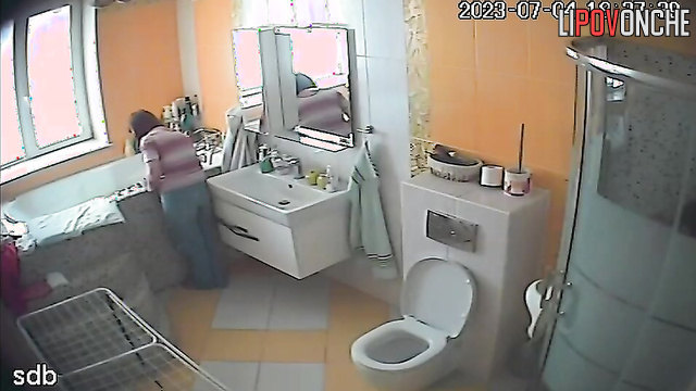 Adult daughter completely undresses in front of her elderly mother