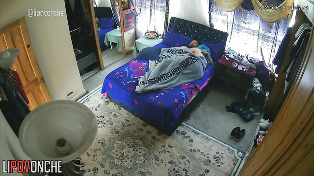 A tattooed man wakes up and inserts his thick cock into his wife's big ass