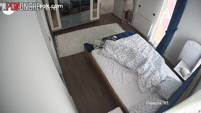 Brunette relaxing alone in the bed before sound sleep
