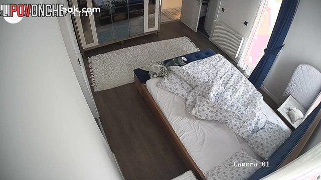 Brunette relaxing alone in the bed before sound sleep