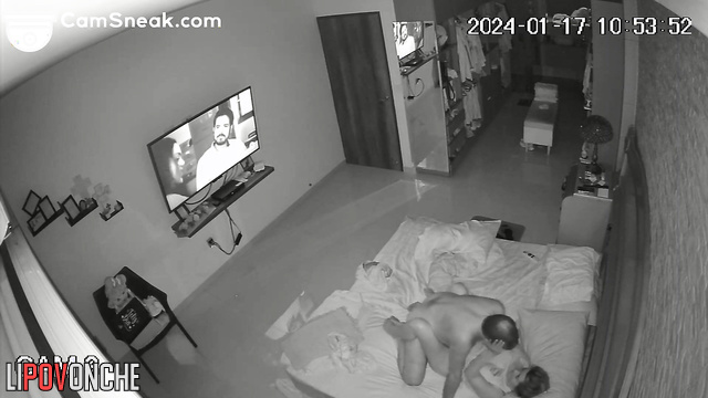 Married couple teasing each other in bed right now