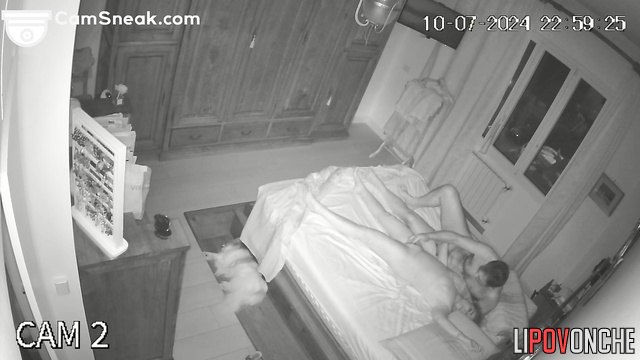 Boyfriend kissing his beauty legs in the cozy bedroom
