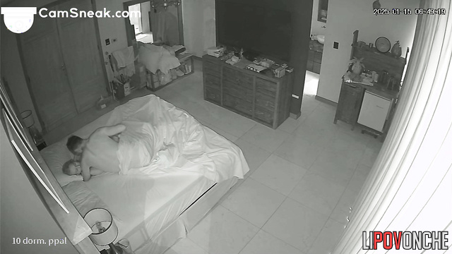 A sexually aroused husband wakes up his sleepy wife by playing with her pussy