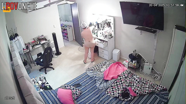 Big beauty woman gets dressed and smears her body with strawberry cream