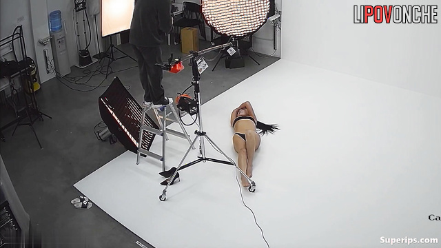 Asian beauty taking part in a photo shoot right now