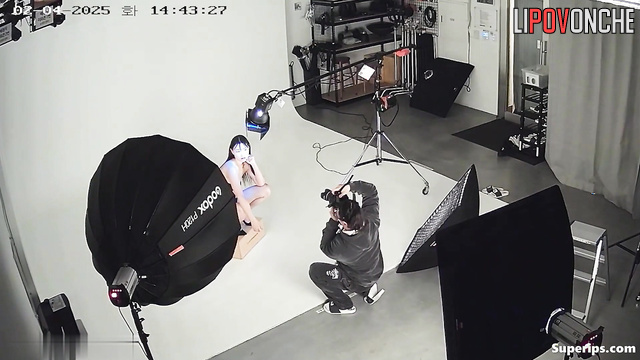 Asian beauty taking part in a photo shoot right now