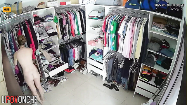 Young woman changing their outfits in the dressing room