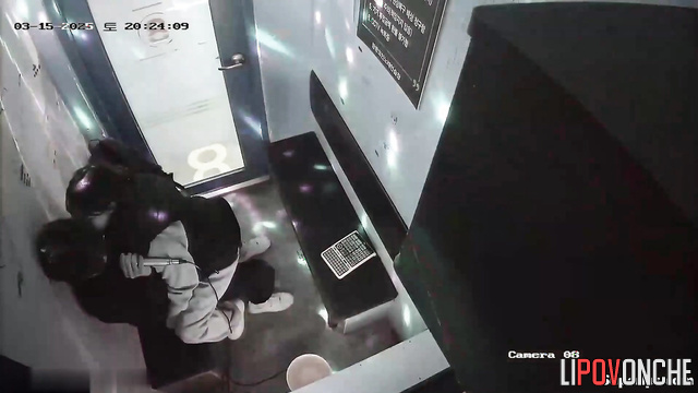 Asian couple kissing in karaoke booth (teens having fun)
