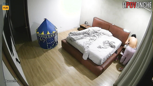 Couple getting ready for bed - hidden night video
